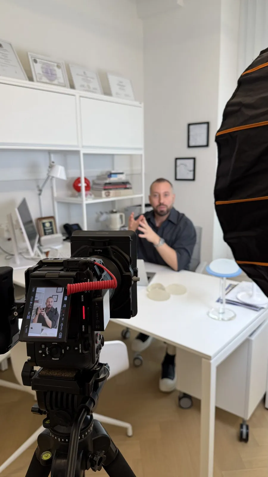 Behind the scenes: filming a doctor at his desk