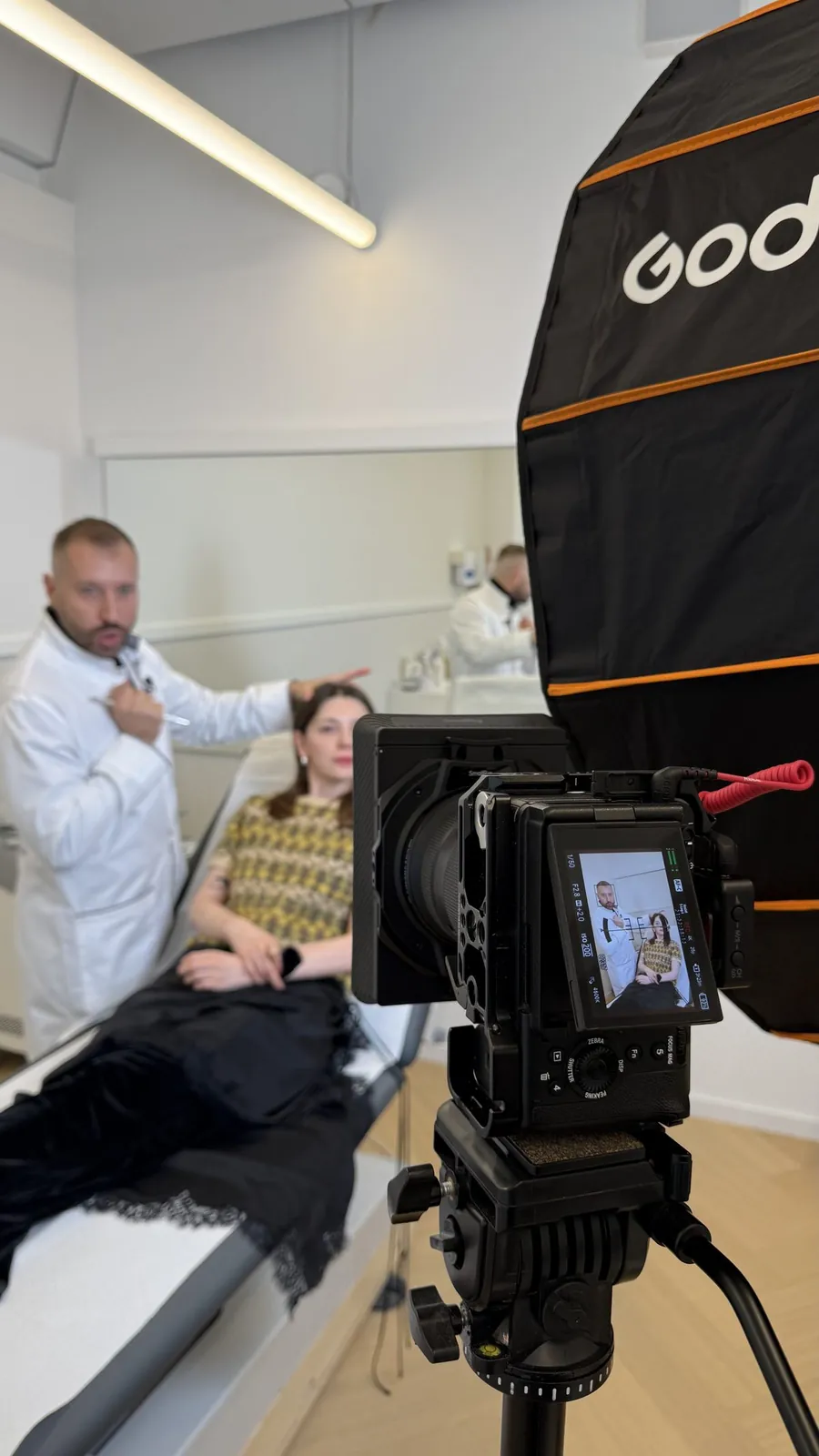 Behind the scenes: filming a doctor with a patient